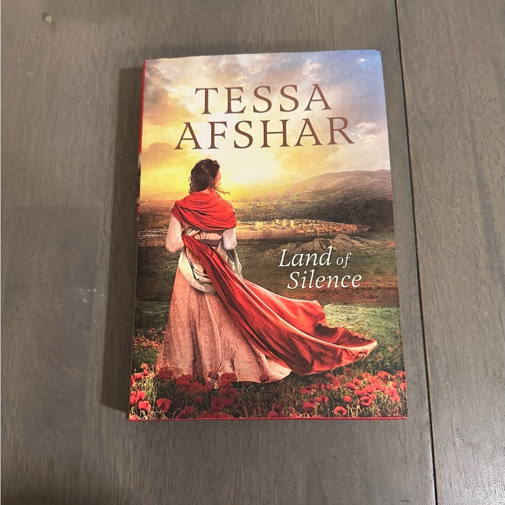 'Land of Silence' Book - Red and Brown Cover